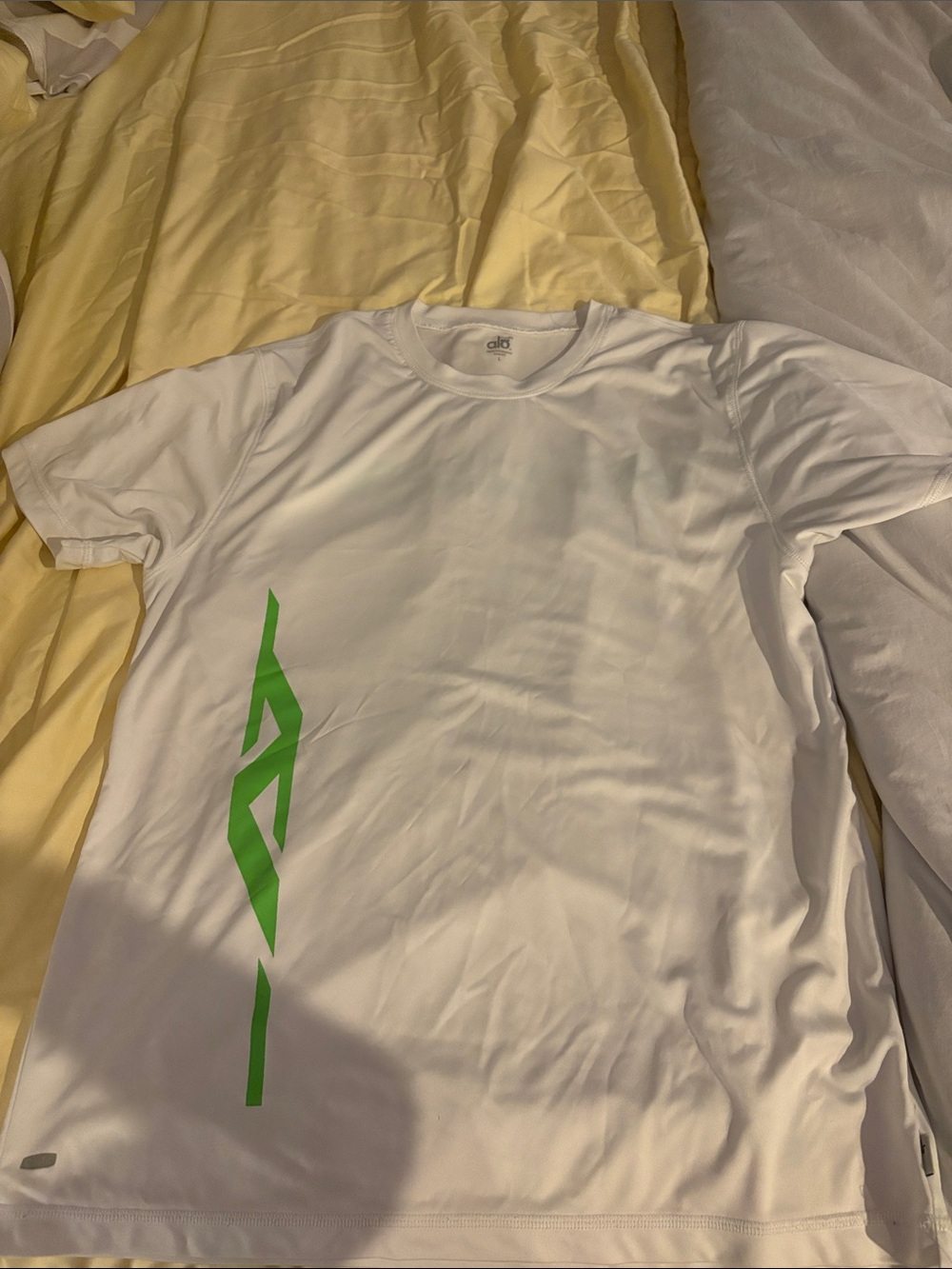 ALO Yoga Men’s White Short Sleeve Tee with Lime Green Vertical Graphic